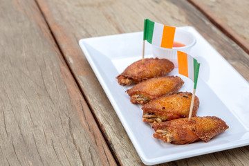 chicken wings on wooden table