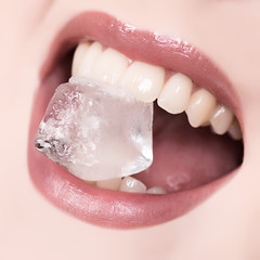 close up mouth and ice cube