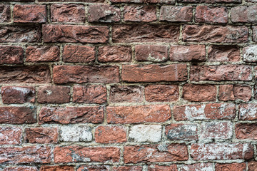 Destroyed the old red brick wall