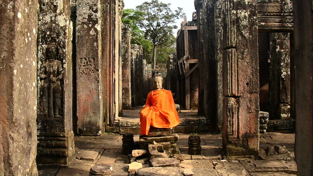 Zoom Out - Robed Buddha in Ancient Temple  - Angkor Wat Temple Cambodia