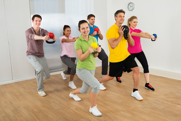 Fototapeta na wymiar Multiethnic Group Of Happy People Exercising