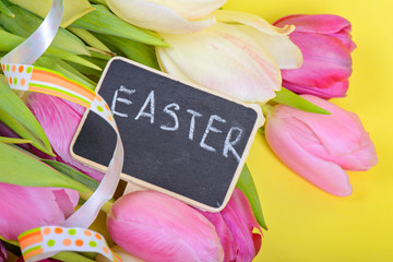 Easter ribbon, tulips and small chalkkboard