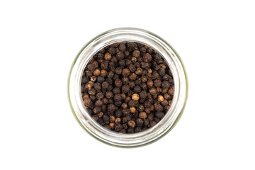 Black pepper in glass bottle