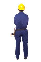 Rear view of a contractor standing on white background