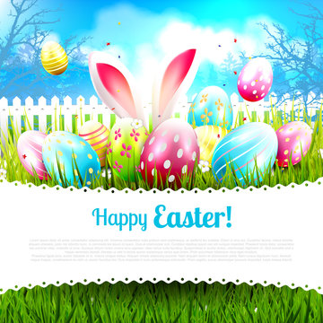 Sweet Easter greeting card with colorful eggs in the grass