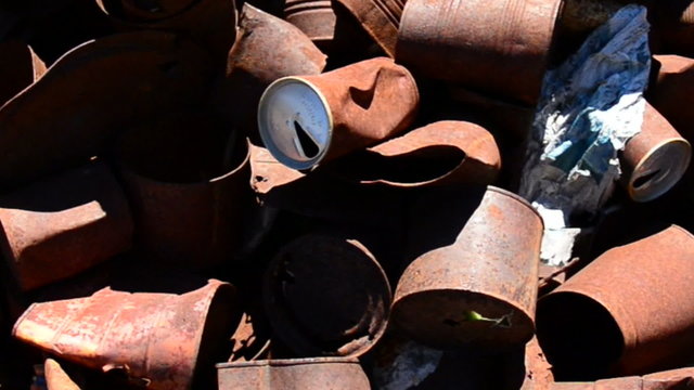 Pan of Rusting Tin Cans in a Mojave Desert