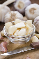 Fototapeta na wymiar Portion of peeled Garlic