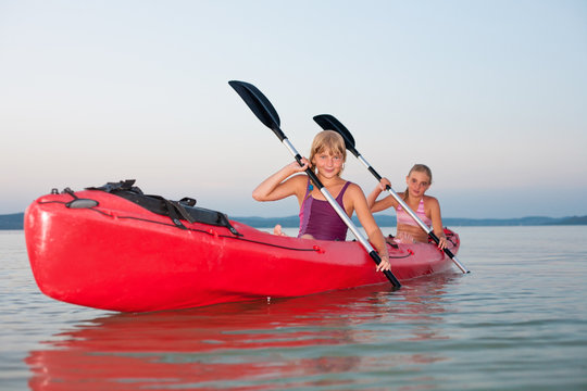 Girls with red kayak