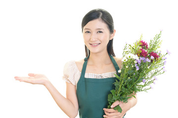 花束を持つ女性