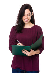 Fototapeta premium Woman write on clipboard
