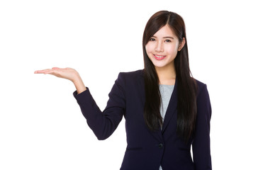 Asian businesswoman with open hand palm