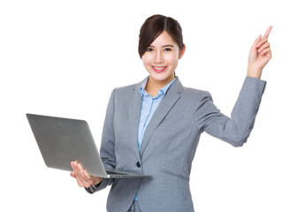 Businesswoman use of laptop and finger point up