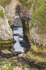 Rocky caves on coastline Flamborough Head