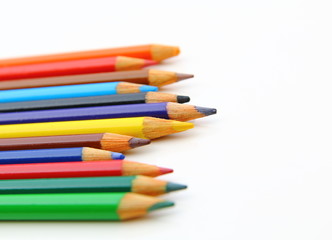 Colour pencils isolated on white background