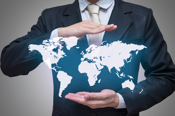 Businessman standing posture hand holding world map isolated