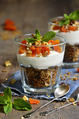 Dessert from granola,yogurt,nuts and dried apricot.