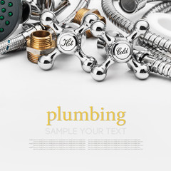 plumbing and tools on a light background