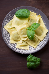 Ceramic plate with italian ravioli, view from above