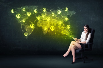 Businesswoman in office with tablet and social network world map