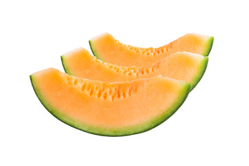 freshly cut melon on white background