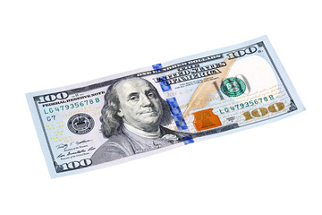 One hundred dollar bill close-up isolated on white. Stacked shot