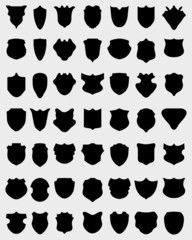 Black silhouettes of shields, vector