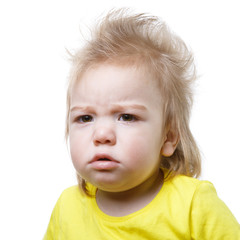 Portrait of an upset baby isolated on white background