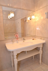 Bathroom interior fragment in light tones