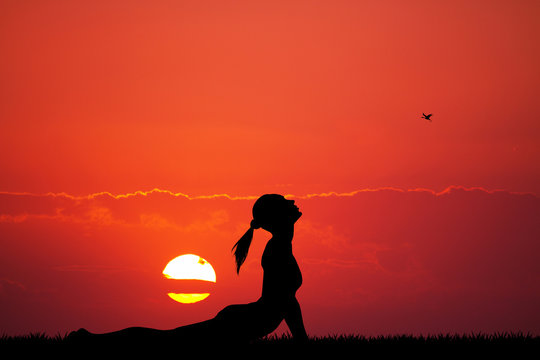 yoga pose at sunset
