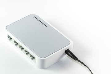 5 port ethernet switch with power on white background