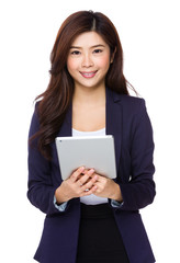 Businesswoman use of digital pad