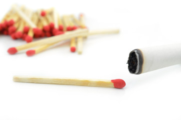 cigarette and match