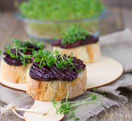 Bruschetta with roasted beet and watercress salad