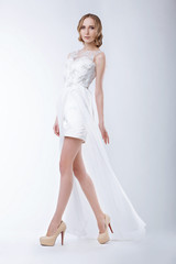 Naklejka premium Slender Fashion Model Wearing White Dress