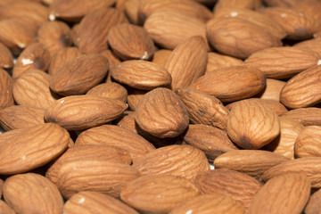 Shelled almonds closeup, background