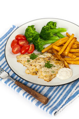 Fried Catfish fillet with vegetables on white background