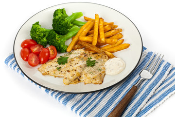 Fried Catfish fillet with vegetables on white background