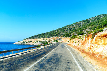 Mountain road on the sea coast in Turkey