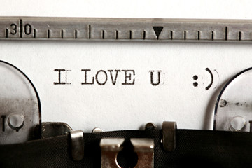 Word I LOVE YOU written on an old typewriter