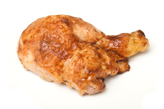 Cuisse de poulet roti sur fond blanc