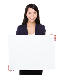 Businesswoman show with white poster