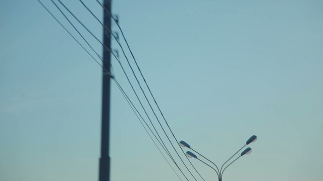 Row of wire pole along road
