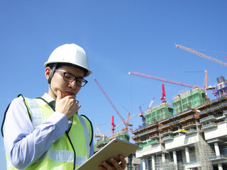 Construction worker using tablet