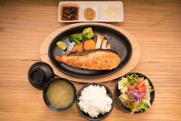 Set of grilled japanese salmon steak with rice, miso soup and fr