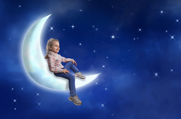 Fototapeta na wymiar Little girl sits on the moon