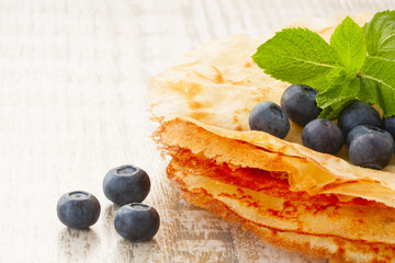 crepes with blueberries and  mint