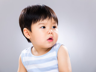Asian baby look at other side
