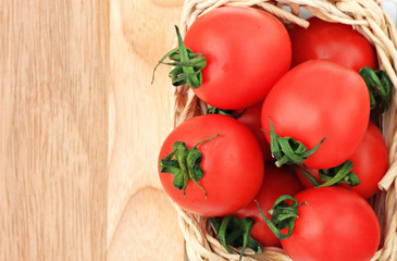 tomatoes in straw basket