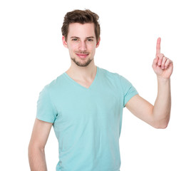 Young man with finger point up