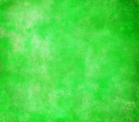 Fototapeta na wymiar bright green background with old black and light shading border